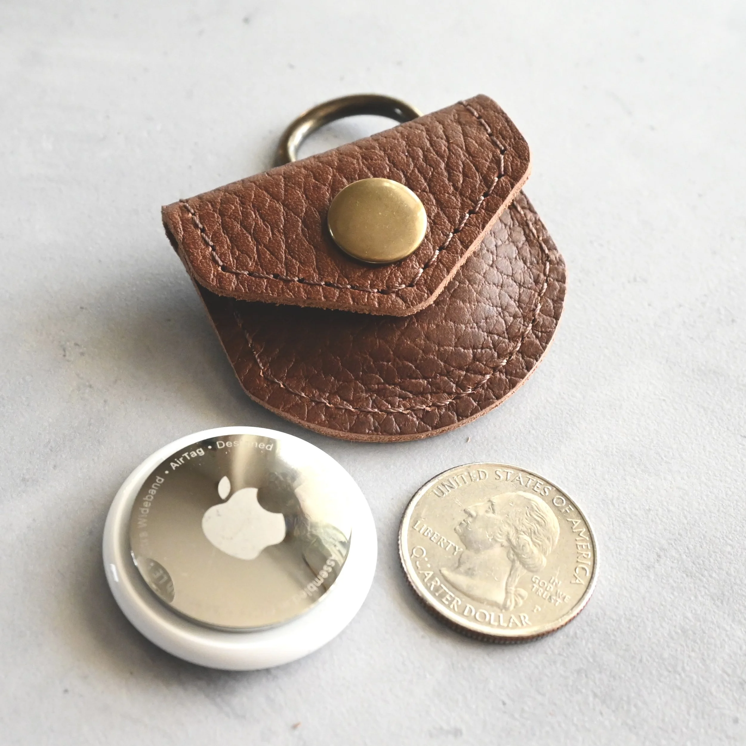 Handmade Leather AirTag or Quarter Keeper — Stitch & Rivet